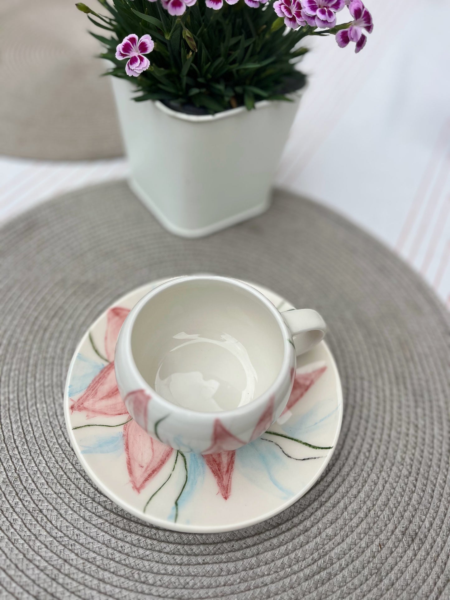 Hand-Painted Ceramic Cup and Saucer Set with Soft Pink Floral Design