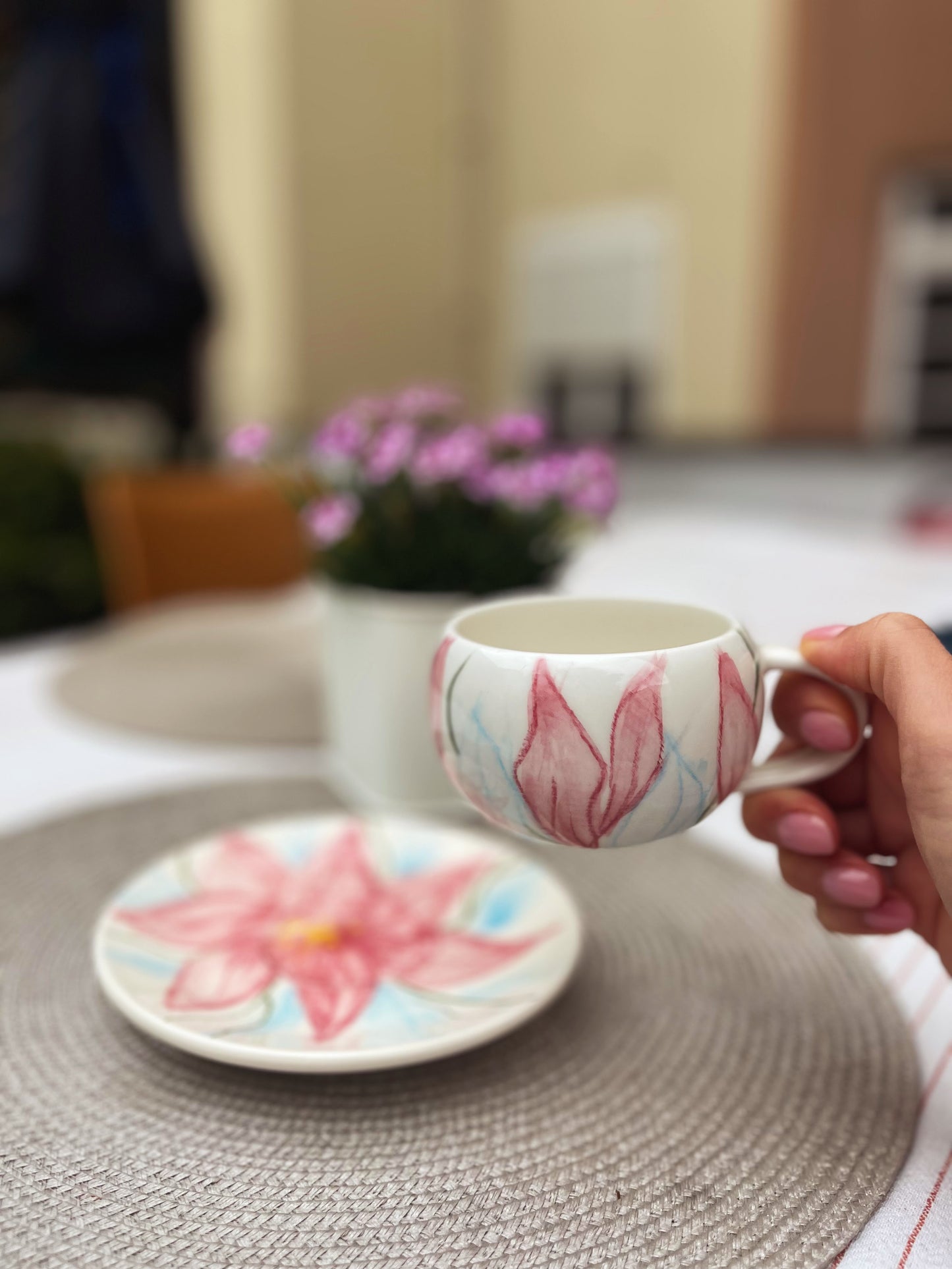 Hand-Painted Ceramic Cup and Saucer Set with Soft Pink Floral Design