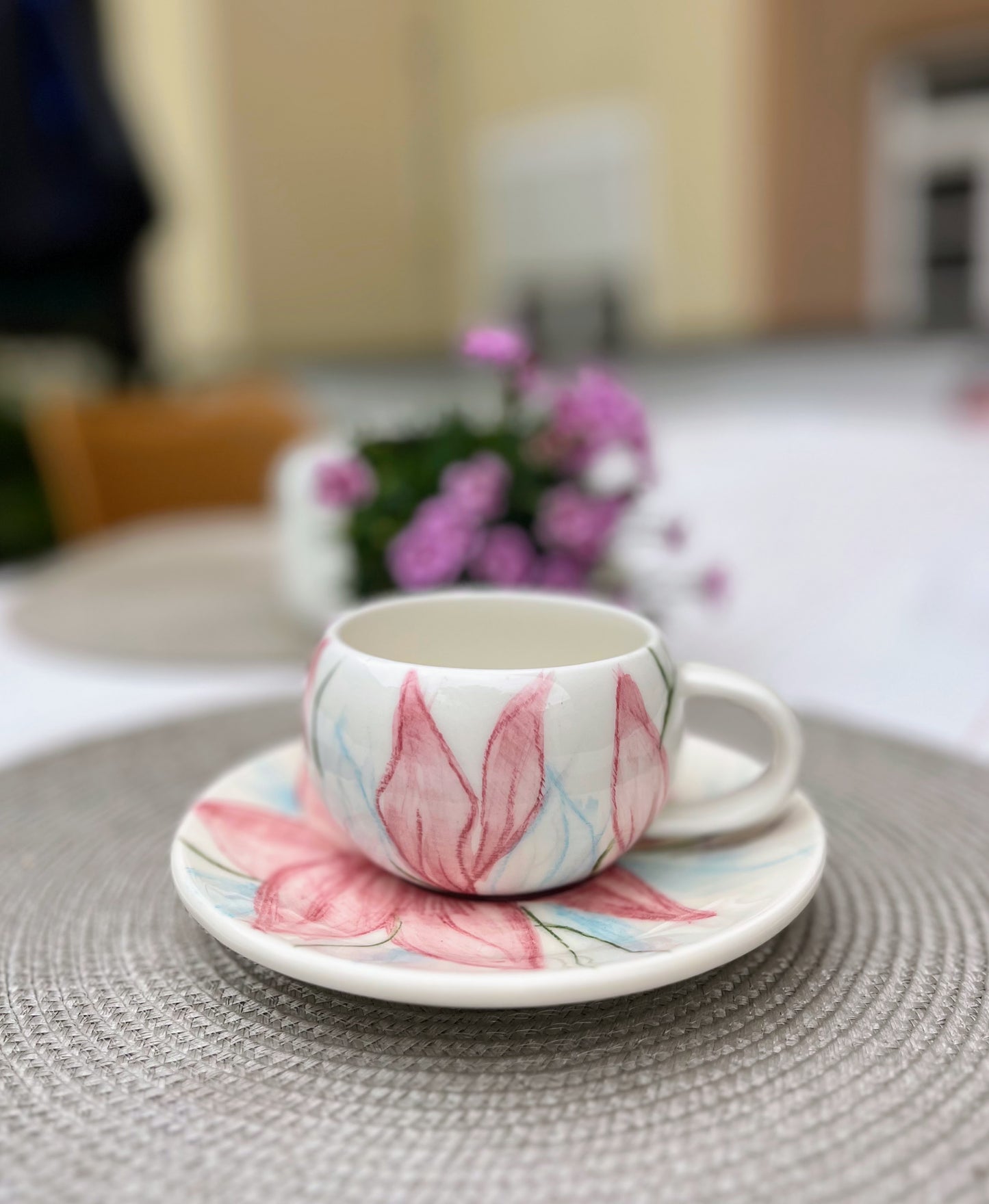 Hand-Painted Ceramic Cup and Saucer Set with Soft Pink Floral Design